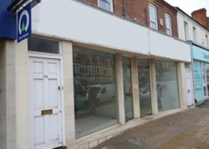 PROMINENT DOUBLE-FRONTED SHOP PREMISES